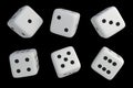 Set of white dice with black dots isolated on black Royalty Free Stock Photo