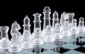 Set of white glass chess pieces Royalty Free Stock Photo