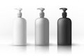 A set of white, gray, black plastic bottles for sanitary and antiseptic products. Object, shadow and reflection on