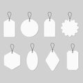 Set white labels in different shapes with string isolated on grey background. Blank card and sticker. Tags for price, gift, Royalty Free Stock Photo