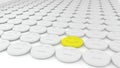 Set of white pills and one yellow Royalty Free Stock Photo