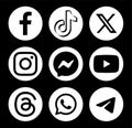 Set of white round popular Social Media and Mobile Apps icons: Facebook, TikTok, Twitter - X, Messenger and others, on Royalty Free Stock Photo