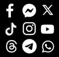 Set of white signs of popular Social Media and Mobile Apps icons: Facebook, Messenger, Twitter - X, TikTok and others Royalty Free Stock Photo