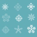 Set of white snowflakes on a blue background Royalty Free Stock Photo