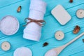 Set of white spa bathroom stuff on blue wooden desk. Royalty Free Stock Photo