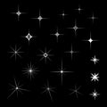 Set of White Sparkles on an isolated black background