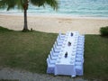 Set of white table and chairs for private dinner party. Royalty Free Stock Photo