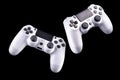 Set of white video game joysticks gamepad isolated on a black background Royalty Free Stock Photo