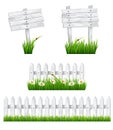 Set of white wooden signs and a fences with grass. Royalty Free Stock Photo