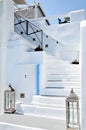 Set of whitewashed stairs leading up to a traditional stone building Royalty Free Stock Photo