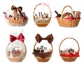 Set with wicker baskets full of different gifts on white background