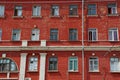 Set of windows on a red brick wall of an old building Royalty Free Stock Photo