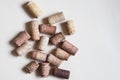 Set of wine cork stoppers on beige background. Top view Royalty Free Stock Photo