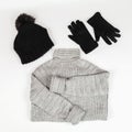 A set of winter clothes. Modern womens clothing on a white background