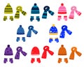 A set of winter colored hats, scarves and mittens with a pattern. vector isolated on a white background Royalty Free Stock Photo