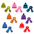 A set of winter colored scarves and hats with a pattern. vector isolated on a white background Royalty Free Stock Photo