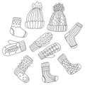 Set with winter knitted clothes in doodle sketch style Royalty Free Stock Photo