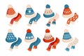 A set of winter knitted hats and scarves with an ornament of snowflakes. Decor element, vector