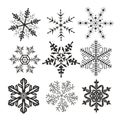 Set of winter snowflakes, nine black natural silhouettes