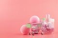 Set of women`s cosmetics for body care, pink bath bomb, skin salt Royalty Free Stock Photo