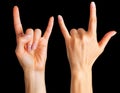 Set of women`s hands showing rock n roll sign or giving the devil horns gesture Royalty Free Stock Photo