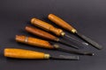 Set of wood chisel for carving wood, sculpture tools on gray background