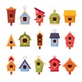 Set of Wooden Bird Houses Different Shapes and Sizes, Colorful Birdhouses, Home or Nest with Roof, Round or Heart Hole Royalty Free Stock Photo