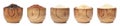 Set of wooden bowls with different uncooked rices