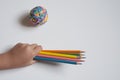 Set of wooden colored pencils in hand for school illustration