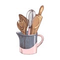 Set of wooden cooking utensils in a cup