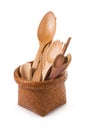 Set of wooden cutlery in Wicker baskets isolated on a white back Royalty Free Stock Photo