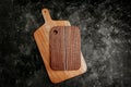 set of wooden cuttng boads on black background. Wooden kitchen block close up