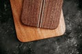 set of wooden cuttng boads on black background. Wooden kitchen block close up
