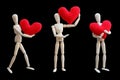 Set of Wooden dummy holds red heart