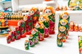 Set of wooden painted dolls matryoshka on the counter of a souvenir shop for tourists Royalty Free Stock Photo