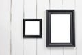 Set wooden picture frame of blank on white wood floor