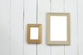 Set wooden picture frame of blank on white wood floor