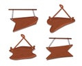 Set of wooden pointers suspended on chains, ropes. 4 hanging signboards with copy space. Royalty Free Stock Photo