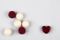 Set of woolen balls and heart as a symbol of home full of love