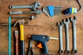 Set of work tools on old grunge wood background Royalty Free Stock Photo