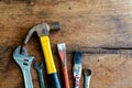 Set of work tools on old wooden background Royalty Free Stock Photo