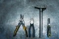 Set working tools lying on metal table Royalty Free Stock Photo