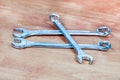 Set of wrenches hand tools for fixing on wood background Royalty Free Stock Photo