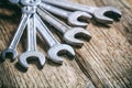 Set of wrenches on wooden background Royalty Free Stock Photo