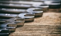 Set of wrenches on wooden background Royalty Free Stock Photo