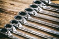 Set of wrenches on wooden background Royalty Free Stock Photo