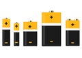 Set of yellow alkaline batteries. Types of rechargeable batteries for electronic devices