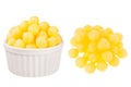 Set of yellow corn sticks balls as heap and in ceramics bowl isolated on white background. Royalty Free Stock Photo