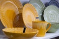 A set of yellow dishes in the shop window