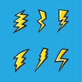 Set of yellow electric lightning bolt icons with shading effects on blue background. Royalty Free Stock Photo